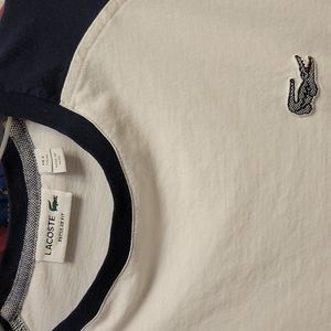 Lacoste shirt sleeve t-shirt. White and blue. Size Medium